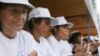 Cambodian women, who are HIV-positive, light candles during a vigil in Phnom Penh, file photo. 