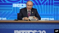 Russian President Vladimir Putin holds a press conference at a BRICS summit in Kazan, Russia, Oct. 24, 2024. 