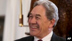 FILE - New Zealand First leader Winston Peters smiles during an election event in Christchurch, New Zealand, Aug. 16, 2017. New Zealanders are expecting to find out Thursday if their next prime minister will be 37-year-old liberal challenger Jacinda Ardern or 55-year-old conservative incumbent Bill English.