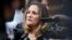 FILE - Canadian Foreign Affairs Minister Chrystia Freeland speaks to reporters as she arrives at the Office of the U.S. Trade Representative, Sept. 11, 2018, in Washington. 