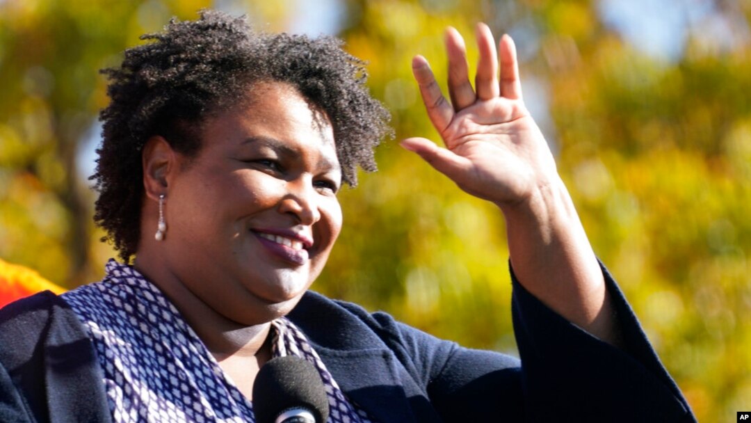 FILE - Stacey Abrams speaks at a campaign rally for Joe Biden at Turner Field in Atlanta, Nov. 2, 2020. 