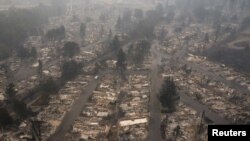 The gutted Medford Estates neighborhood is seen in the aftermath of the Almeda Fire in Medford, Oregon, Sept. 11, 2020.