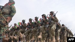 Afghan National Army soldiers march during a ceremony in a military base in the Guzara district of Herat province on Feb. 28, 2019. 