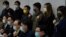 Pro-democratic party members shout slogans in response to the mass arrests during a press conference in Hong Kong Wednesday, Jan. 6, 2021. About 50 Hong Kong pro-democracy figures were arrested by police on Wednesday under a national security law,…