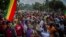 Thousands of protestors from the capital and those displaced by ethnic-based violence over the weekend in Burayu, demonstrate to demand justice from the government in Addis Ababa, Ethiopia Monday, Sept. 17, 2018. Several thousand Ethiopians have gone out onto the streets of the capital to protest ethnic-based attacks in the outskirts of the city in which more than 20 people died over the weekend. Banner in Amharic reads "The government should stop the attacks against our people."