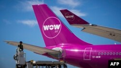 FILE - A picture taken on August 6, 2018 shows a Wow plane on the tarmac of Roissy-Charles de Gaulle Airport, north of Paris. 