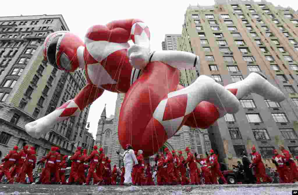 A Power Ranger balloon cruises along Central Park West during the Macy&#39;s Thanksgiving Day Parade, in New York.