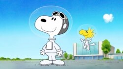 SNOOPY-EN EL ESPACIO