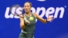 FILE - Zheng Qinwen, of China, plays during the quarterfinals of the U.S. Open tennis championships in Flushing, New York, Sept. 3, 2024. (Robert Deutsch-Imagn Images via Reuters)