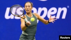 FILE - Zheng Qinwen, of China, plays during the quarterfinals of the U.S. Open tennis championships in Flushing, New York, Sept. 3, 2024. (Robert Deutsch-Imagn Images via Reuters)