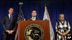 California Attorney General Xavier Becerra, with Gov. Gavin Newsom and state Air Resources Board Chair Mary Nichols, discusses the U.S. government pledge to revoke California's authority to set vehicle emissions standards, in Sacramento, Sept, 18, 2019.