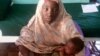 La rescapée de Chibok reçue par le président Buhari au Nigeria