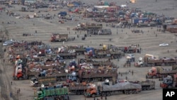 FILE - Afghan refugees settle in a camp near the Pakistan-Afghanistan border, in Torkham, Afghanistan, on Nov. 3, 2023. Pakistan’s top court in the capital, Islamabad, began hearing Friday, Dec. 1, a petition seeking to halt the deportation of Afghan refugees.