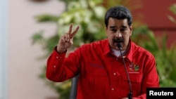 FILE - Venezuela's President Nicolas Maduro speaks at a meeting of the Sao Paulo Forum in Caracas, Venezuela, July 28, 2019.