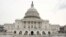Runners stride past the U.S. Capitol building on the day of U.S. President Donald Trump's evening State of the Union address to a joint session of the U.S. Congress at the Capitol in Washington, U.S. Jan. 30, 2018. 