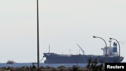 2014年3月8日,曾懸掛北韓國旗的晨曦號油輪停泊在利比亞的錫德爾港.