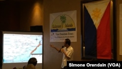 Mayor Eugenio Bito-onon of the Kalayaan Group of Islands, the Philippines-controlled Spratly Islands, points out the Philippines' claims in the Spratlys during a fundraising dinner to gain support for a proposed "ecotourism zone."