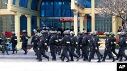 Vietnamese security guard at the entrance to Dong Dang train station where North Korean leader Kim Jong Un is expected to arrive at the border town with China, in Dong Dang, Vietnam, Feb. 25, 2019. 