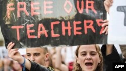 Students of Mehmet Akif College demonstrate against the arrest of their teachers in Pristina, March 29, 2018. 