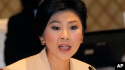 PM Thailand Yingluck Shinawatra membela dirinya terhadap tuduhan korupsi terkait program subsidi beras Thailand (foto: dok). 