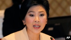 FILE- Thailand's Prime Minister Yingluck Shinawatra, Jan. 28, 2014 in Bangkok.