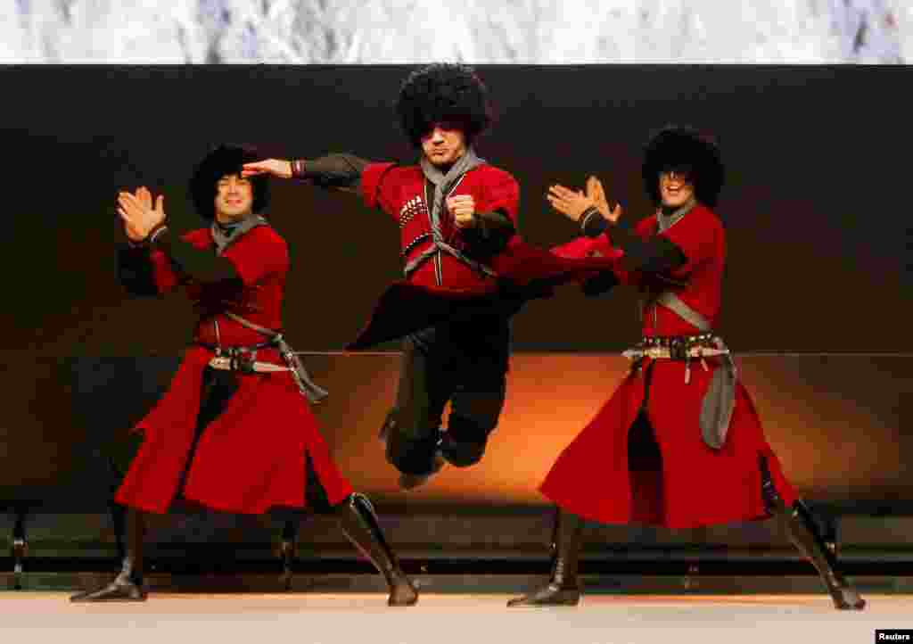 Dancers perform during the Opening Ceremony of the United Nations climate change conference COP29 in Baku, Azerbaijan.