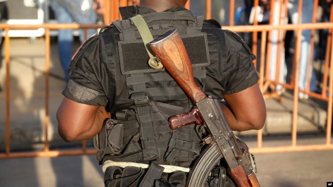 FILE - Ivory Coast troop provides security before the arrival of incumbent President Alassane Ouattara at his election rally in Abidjan, Ivory Coast. 