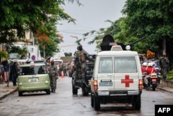 Mozambican soldiers escort VIP's to parliament in Maputo, Jan. 13, 2025.