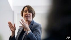 U.S. Sen. Amy Klobuchar, D-Minn., speaks to voters during a campaign stop at a home in Nashua, N.H., Feb. 24, 2019.