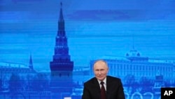 Фото: російський президент Путін під час підсумкового звернення за 2023 рік
