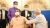 FILE - Thailand's Prime Minister Prayuth Chan-ocha receives an injection of the AstraZeneca coronavirus disease (COVID-19) vaccine at the Government House in Bangkok, Thailand, March 16, 2021. (Reuters)