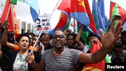 Eritrean refugees participate in a demonstration in support of a U.N. human rights report accusing Eritrean leaders of crimes against humanity in front of the Africa Union headquarters in Ethiopia's capital, Addis Ababa, June 23, 2016. 