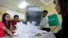 FILE - Officials begin counting ballots after polls closed in Cambodia's general election, at a polling station in Phnom Penh, July 29, 2018. The spokeswoman for the U.S. State Department called the election "neither free nor fair."
