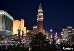 The Venetian tower stands over the Las Vegas Strip in Las Vegas, Nevada.