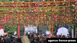 An image of decorations and people from the Jaipur Literature Festival in Boulder, Colorado.