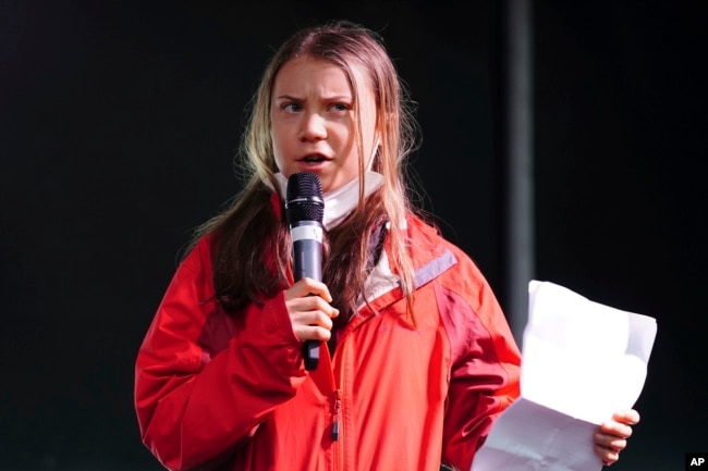 FILE - Climate activist Greta Thunberg speaks on the stage after a protest during the Cop26 summit in Glasgow, Scotland, Nov. 5, 2021. (Jane Barlow/PA via AP)