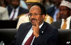 FILE - Somalia's President Mohamed Abdullahi Mohamed, also known as Farmajo, attends his inauguration ceremony in Mogadishu, Somalia, Feb. 22, 2017.