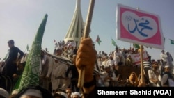 FILE - Demonstrators rally in favor of blasphemy laws in Mardan, Pakistan, April 28, 2017.