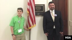 Caldoun Abuhakel and his 12-year-old son, Baraa, traveled to Washington, D.C., from Minnesota to take part in Muslim Advocacy Day, April 18, 2016. (C. Saine/VOA)