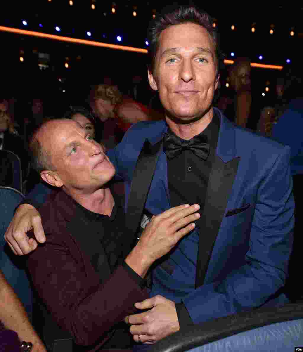 Woody Harrelson, left, and Matthew McConaughey pose at the 66th Primetime Emmy Awards at the Nokia Theatre L.A. Live, Los Angeles, Aug. 25, 2014, in Los Angeles.