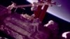 Spacewalking Astronauts Give New Hand to Robot Arm