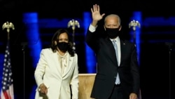 President-elect Joe Biden, right, on stage with Vice President-elect Kamala Harris, left, Saturday, Nov. 7, 2020, in Wilmington, Del.