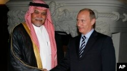 Russian Prime Minister Vladimir Putin greets Head of Saudi Arabia's National Security Council Prince Bandar bin Sultan during a meeting in Moscow, July 2008 file photo.