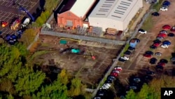 In this image made from video provided by Sky News, the site of a helicopter crash is seen near a carpark by the King Power stadium in Leicester, England, Oct. 28, 2018.