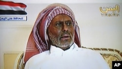 A still image from a video broadcast on Yemen TV shows Yemen's President Saleh speaking from an undisclosed location in Saudi Arabia, July 7, 2011