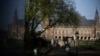 FILE - The Peace Palace housing the International Court of Justice is reflected in a monument in The Hague, Netherlands, May 1, 2024. 