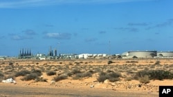 The oil refinery at Ras Lanouf last month when was still in rebel hands, March 5, 2011