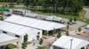 Contractors construct support structures at Fort Lee, Virginia, July 26, 2021, in preparation for the arrival of Afghan special immigrant applicants. (US Army photo)