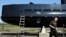 FILE - Submarine owner-builder Peter Madsen is seen with his craft in a April 30, 2008, photo.
