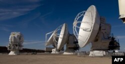 FILE - Radio telescope antennas of the ALMA (Atacama Large Millimeter/submillimeter Array) project, in the Atacama desert, Chile, March 12,2013.
